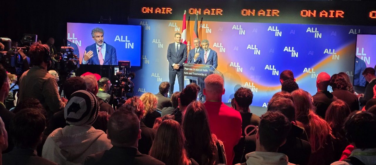 Conférence de presse sur une intelligence artificielle sûre et fiable à ALL IN Montréal 2026.